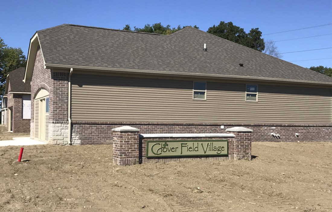 Cloverfield Village - New Construction Homes in Bruce Township MI - clover-sign